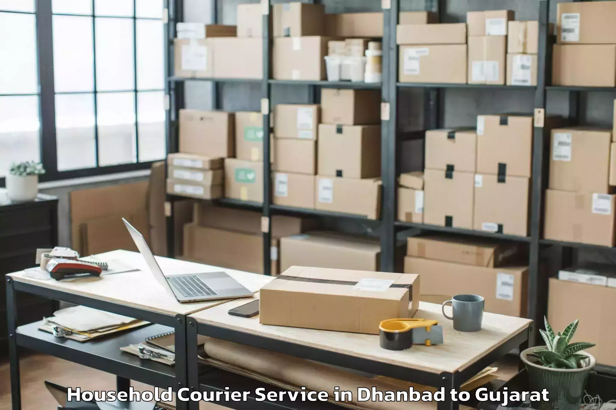 Hassle-Free Dhanbad to Ambaji Household Courier